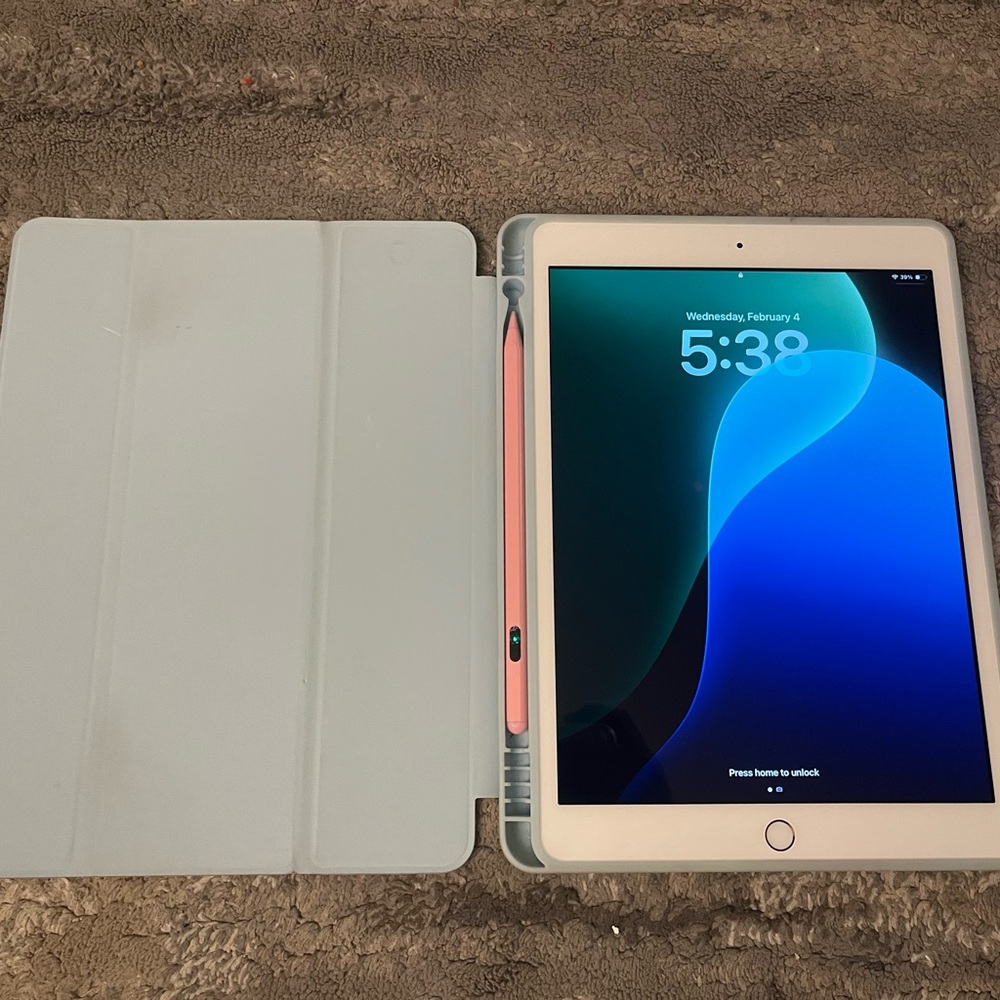 Apple iPad 7th gen with White Cover and Pink Stylus
